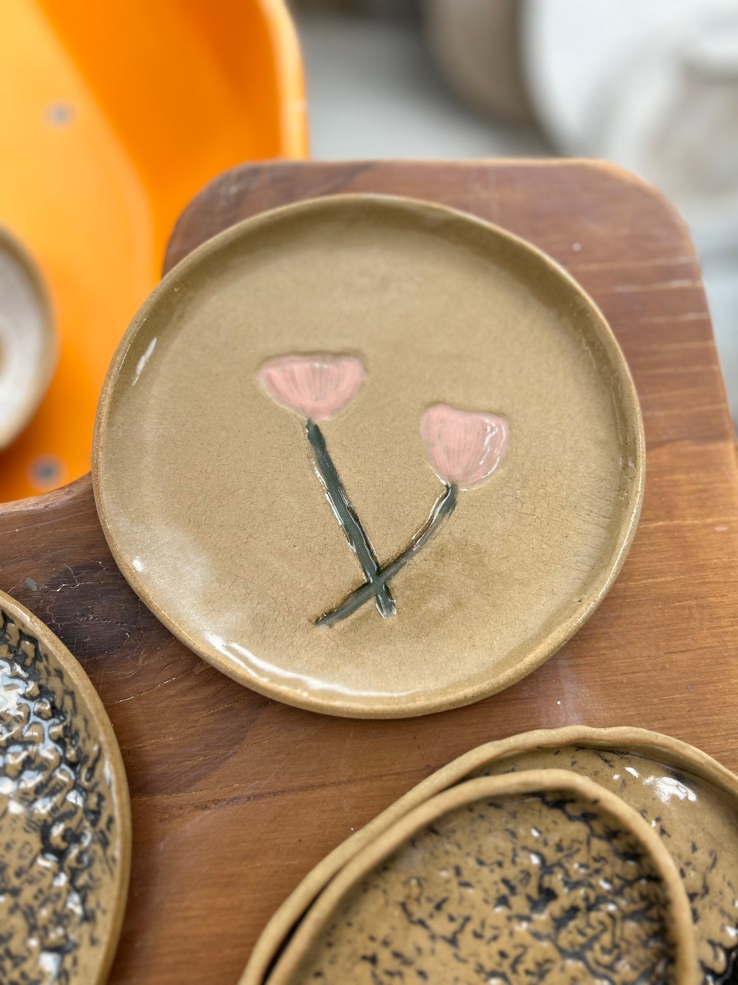 Brown Plate with Pink Flowers.